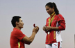 Chinese diver He Zi misses out on gold medal but bags diamond ring as boyfriend propose